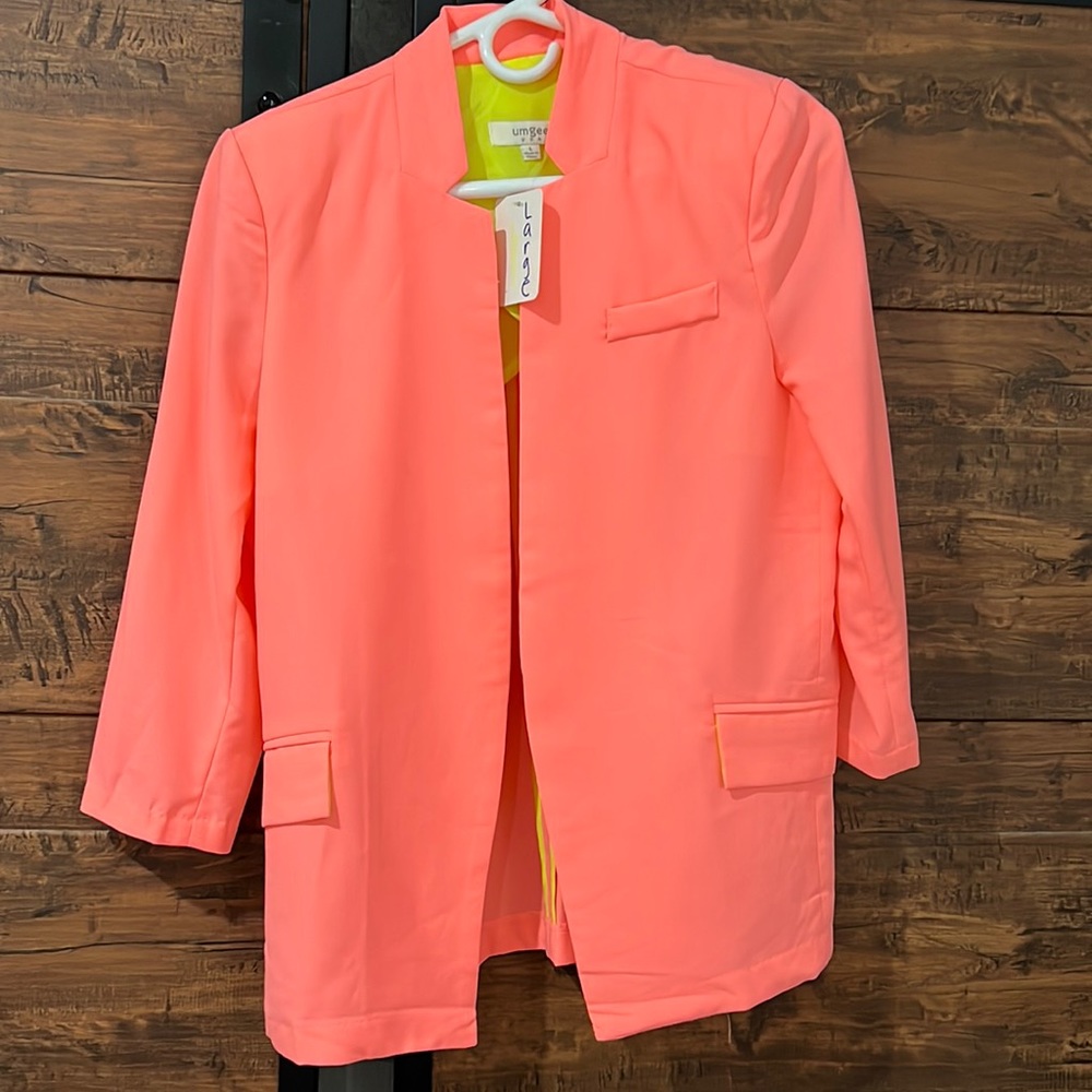 Neon pink blazer with neon yellow accents. New with tags. Size large.